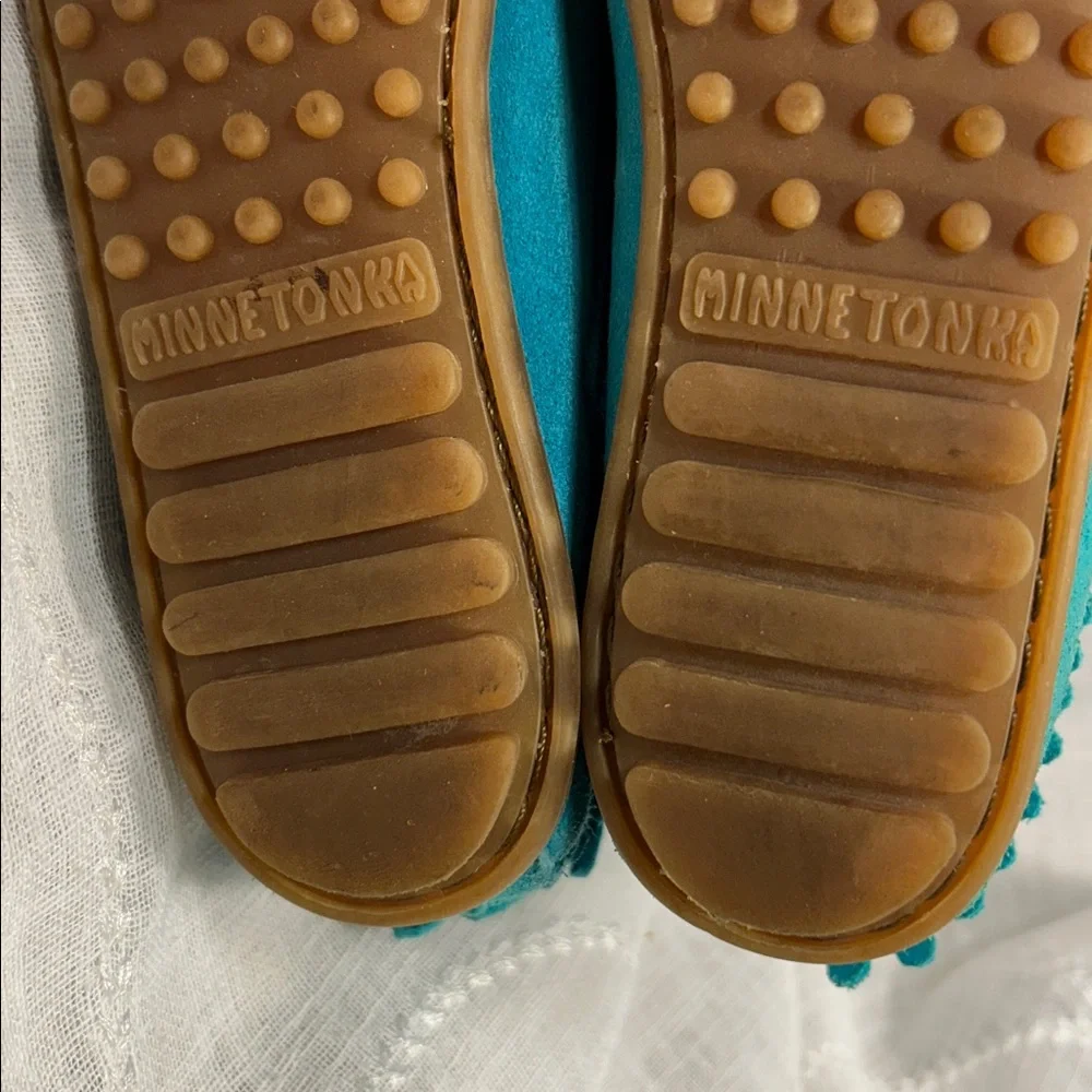 Minnetonka leather fringe moccasins with side zipper